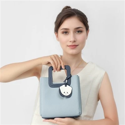 Sommerblaue Lederhandtaschen-Umhängetasche